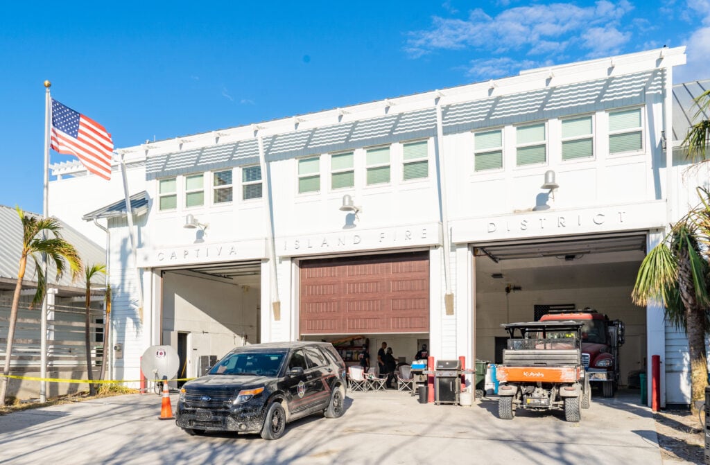 Entrance to Captiva Island Fire Department with equipment and public safety vehicles parked in front